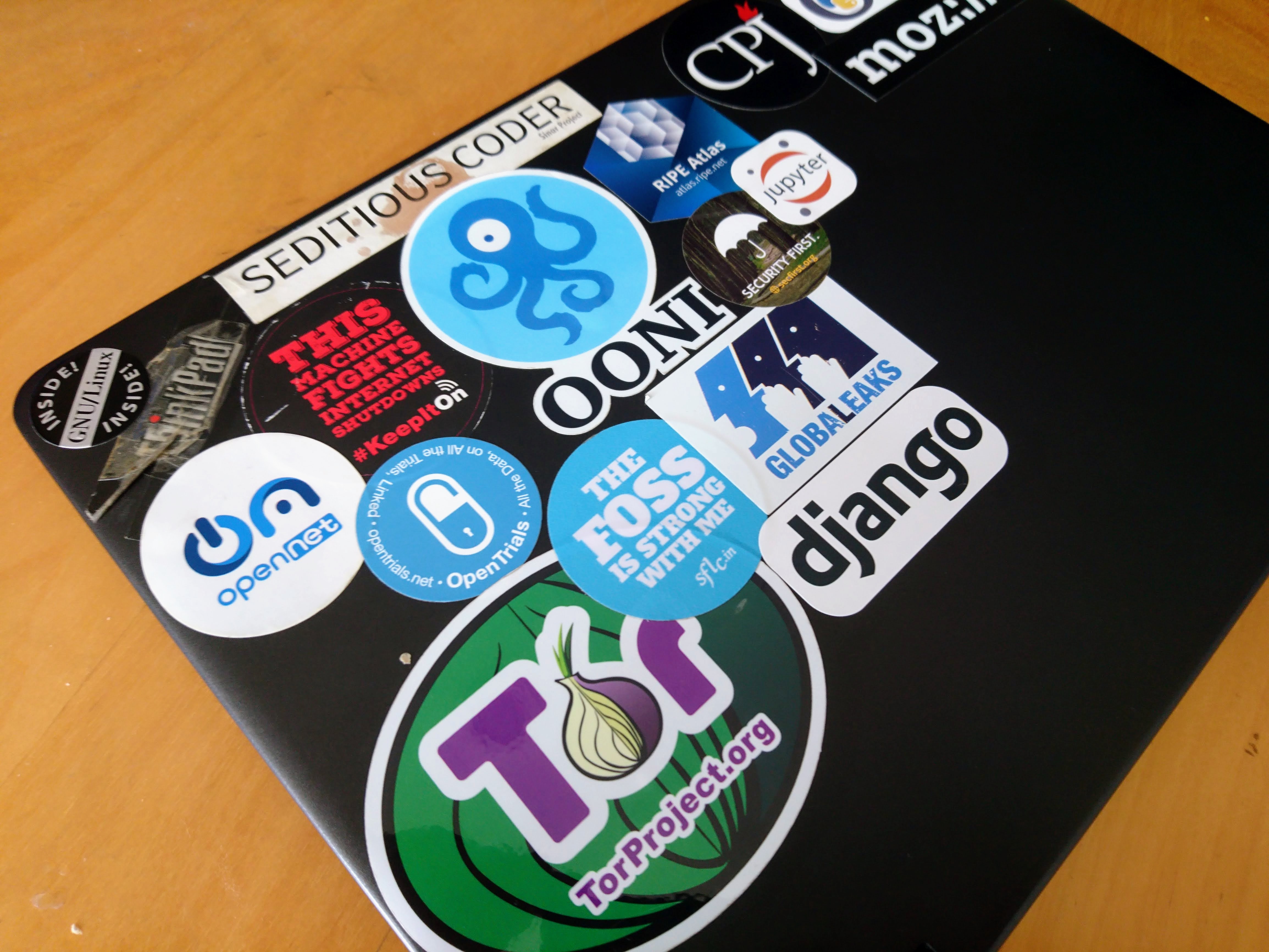 Laptop with stickers of digital rights organisations